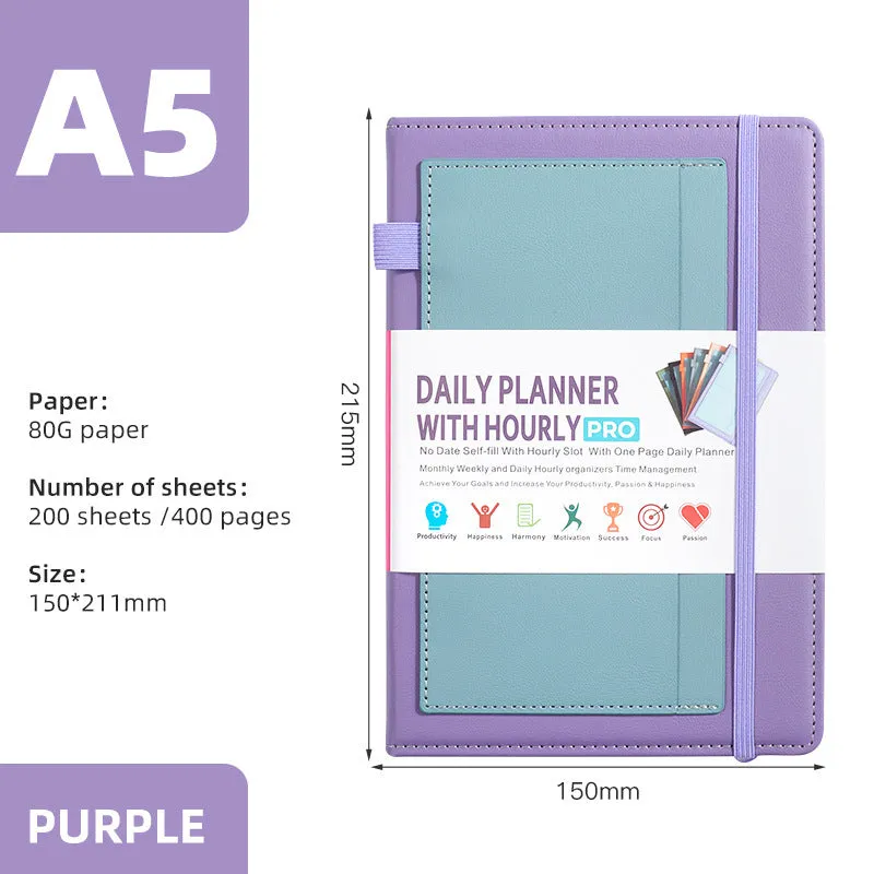 A5 notebook with PU leather cover in various colours, shown open to reveal blank pages and planning stickers.