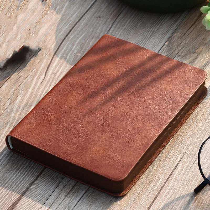 Portable A6 wire-bound notebook with imitation leather cover and pen in black brown grey khaki red