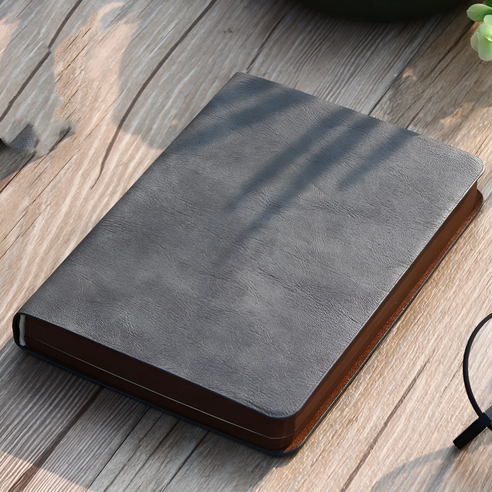 Portable A6 wire-bound notebook with imitation leather cover and pen in black brown grey khaki red
