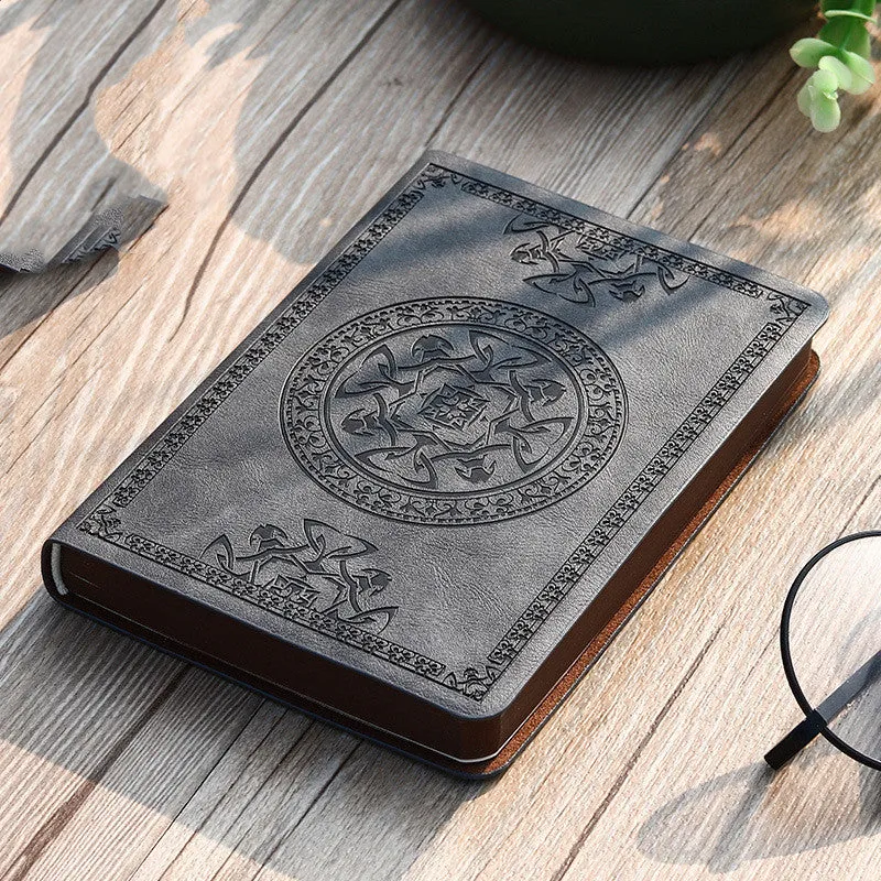 Portable A6 wire-bound notebook with imitation leather cover and pen in black brown grey khaki red