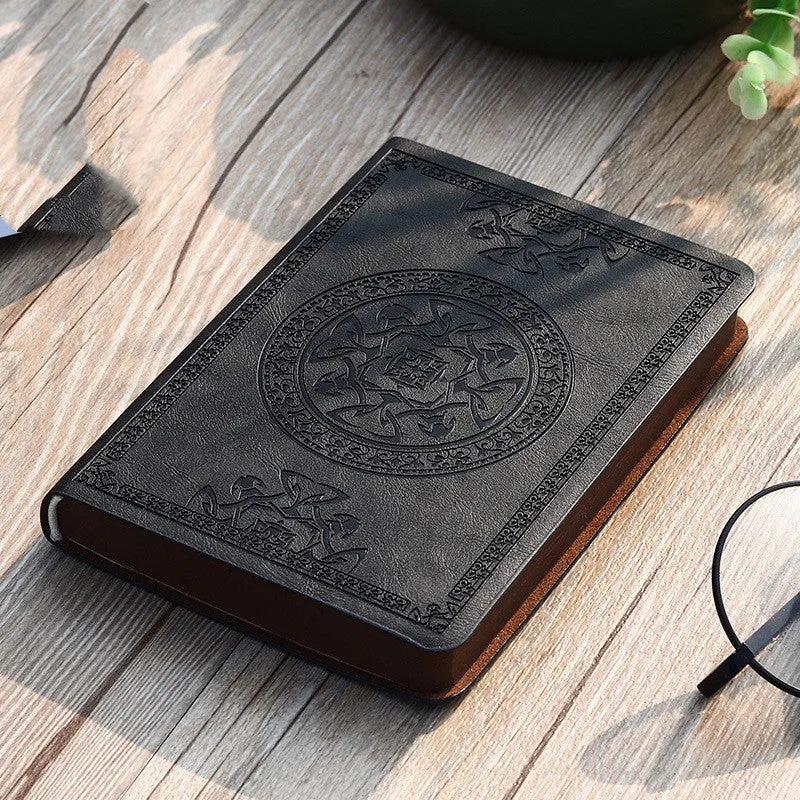 Portable A6 wire-bound notebook with imitation leather cover and pen in black brown grey khaki red