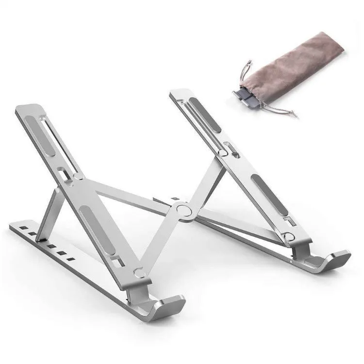 Folding aluminium alloy laptop stand in grey on a wooden desk, showing adjustable width and non-slip pads