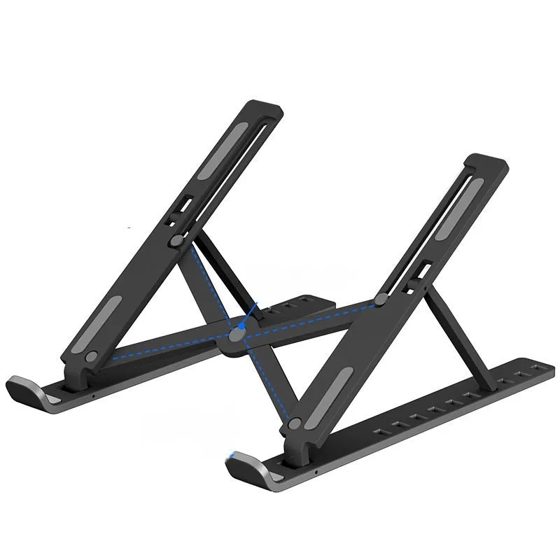 Folding aluminium alloy laptop stand in grey on a wooden desk, showing adjustable width and non-slip pads
