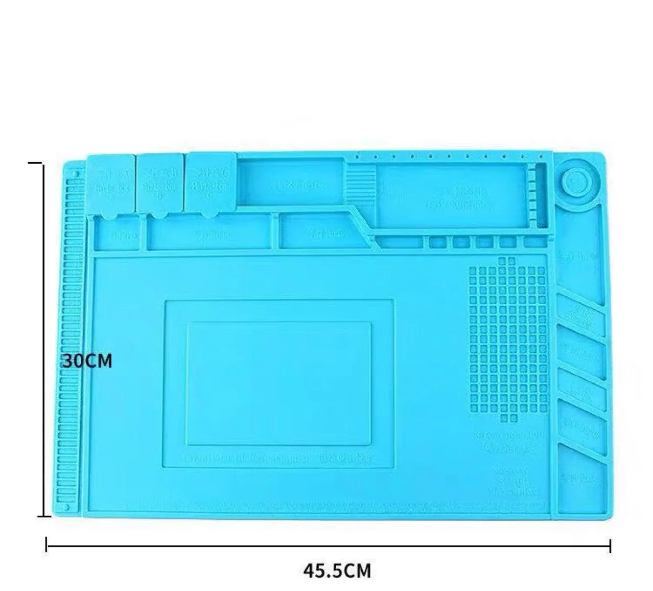 Blue mobile phone computer repair magnetic heat insulation work mat on a desk