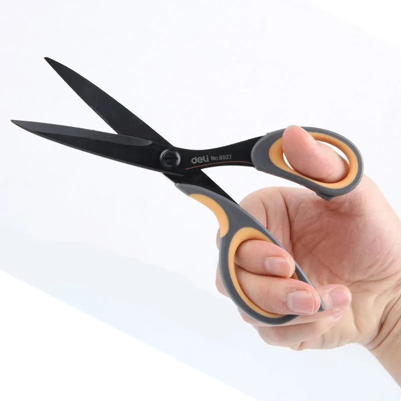 Black plastic handle alloy stainless steel scissors 175mm 6 inch blade on white background