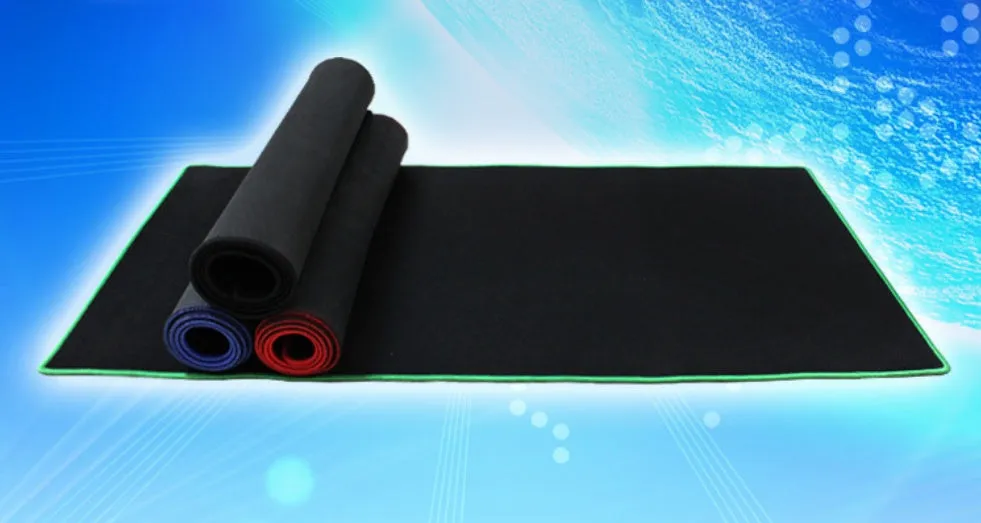 Oversized rubber mouse pad 30x60cm in black with stitched edges for PC laptop use.