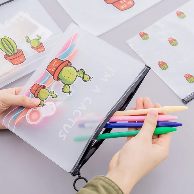 PVC pencil case with sealed closure, cactus print, 17.1x21.2cm, on a desk with stationery