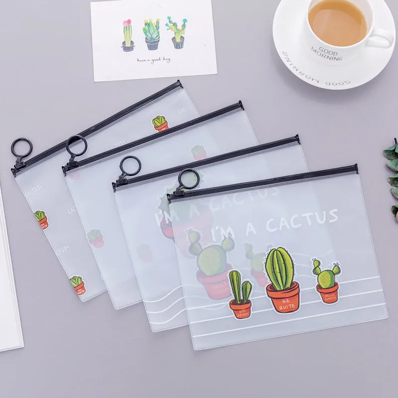 PVC pencil case with sealed closure, cactus print, 17.1x21.2cm, on a desk with stationery