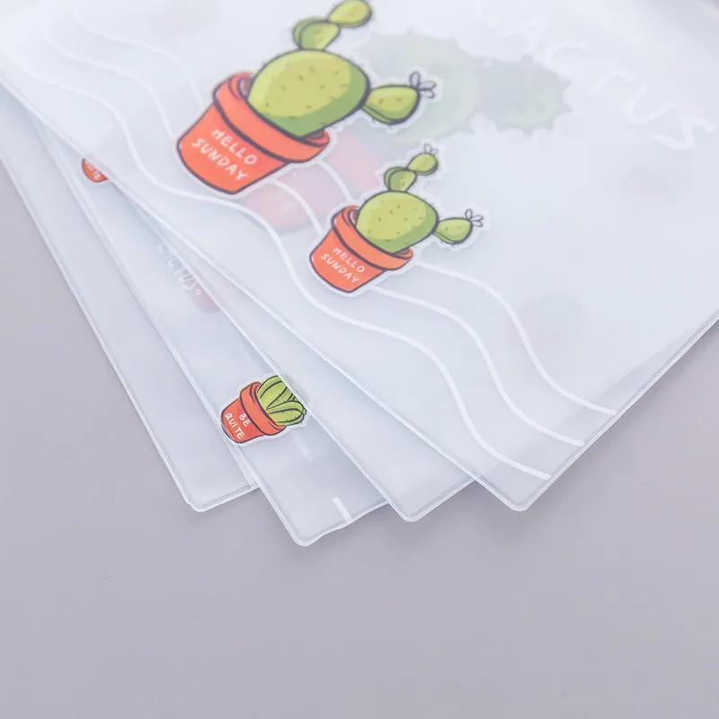 PVC pencil case with sealed closure, cactus print, 17.1x21.2cm, on a desk with stationery