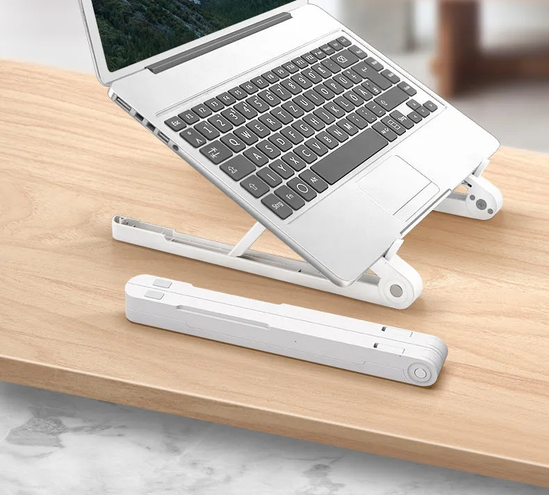 Black ABS folding laptop stand on desk with laptop placed on top