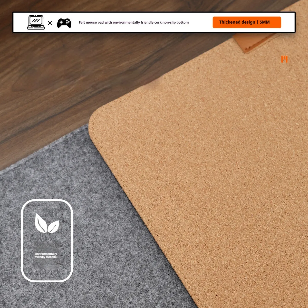 Oversized grey felt and cork office mouse mat on a wooden desk