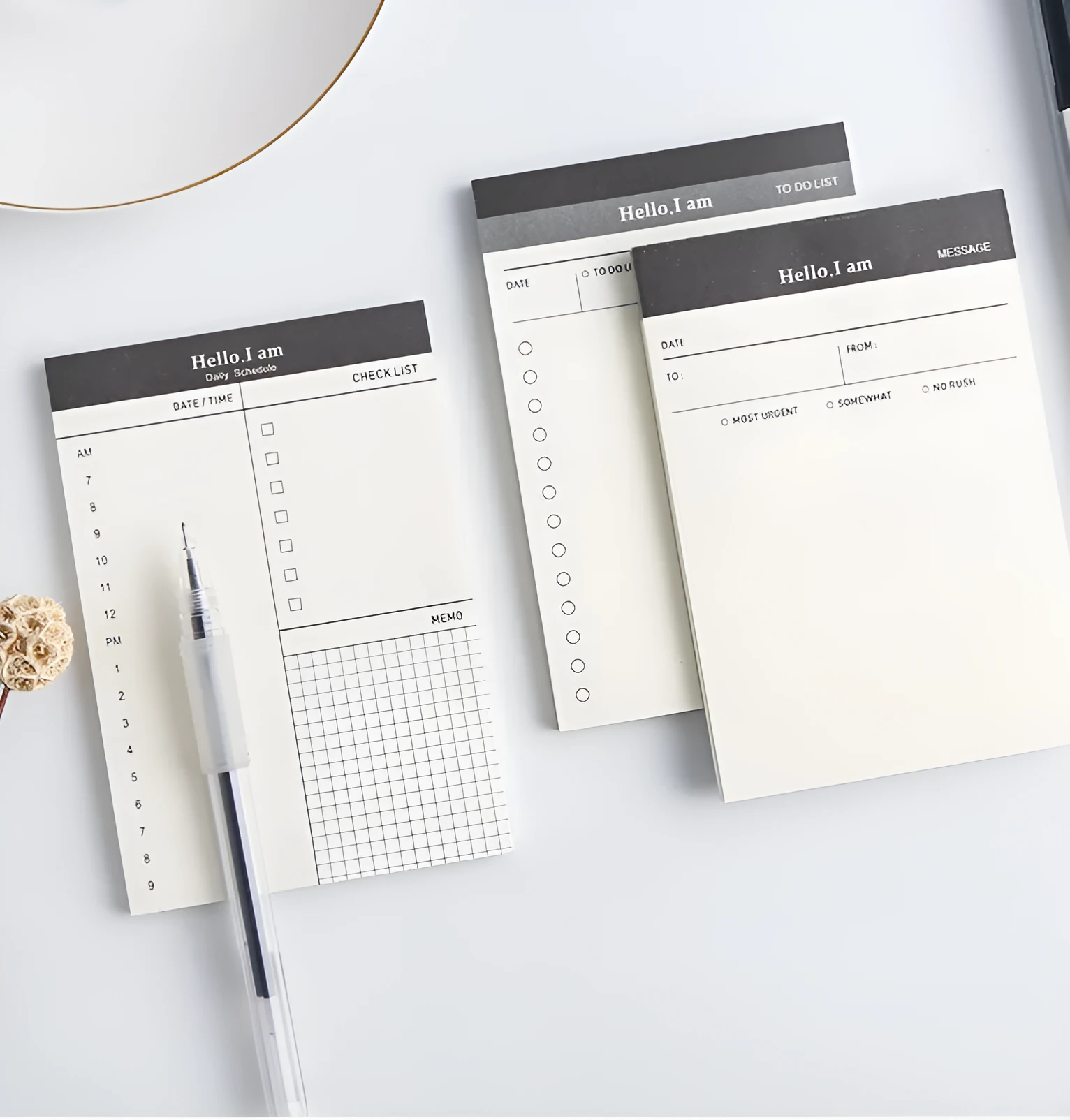 Business day planner notepad with 52 tear-off pages in paper cover, four colour options