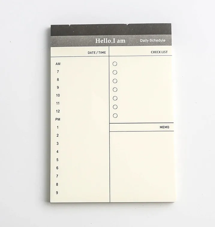 Business day planner notepad with 52 tear-off pages in paper cover, four colour options
