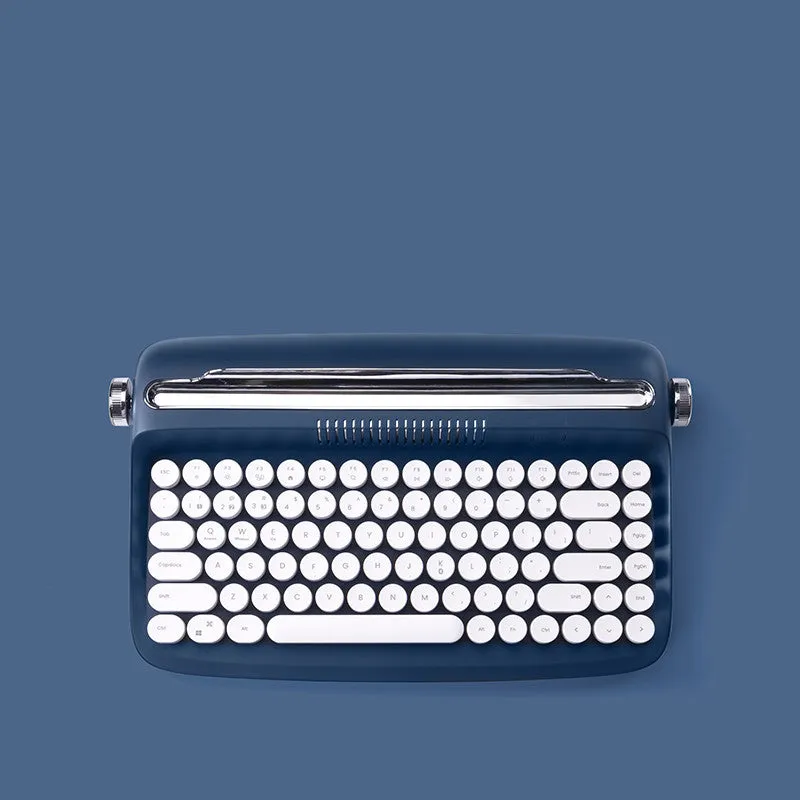 Retro iPad Bluetooth keyboard and mouse set in mint green with blue dual-mode mouse and adjustable bracket