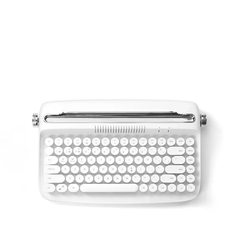 Retro iPad Bluetooth keyboard and mouse set in mint green with blue dual-mode mouse and adjustable bracket