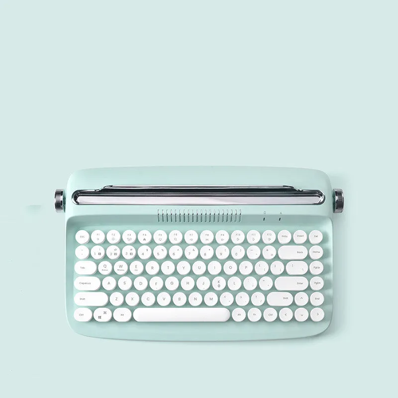 Retro iPad Bluetooth keyboard and mouse set in mint green with blue dual-mode mouse and adjustable bracket