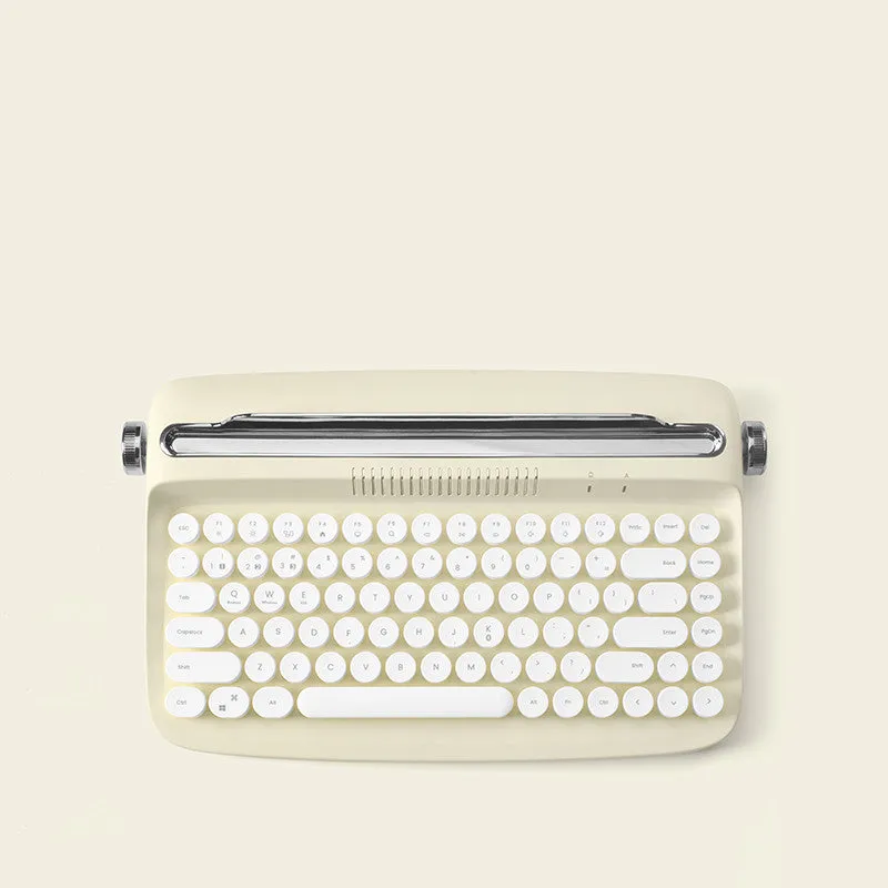 Retro iPad Bluetooth keyboard and mouse set in mint green with blue dual-mode mouse and adjustable bracket
