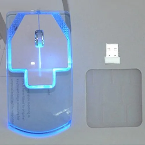 Ultra-thin transparent 2.4GHz wireless optical luminous mouse with blue glow on white desk