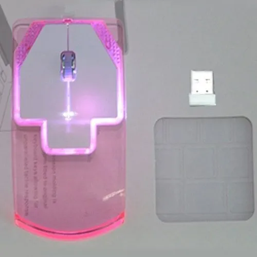 Ultra-thin transparent 2.4GHz wireless optical luminous mouse with blue glow on white desk