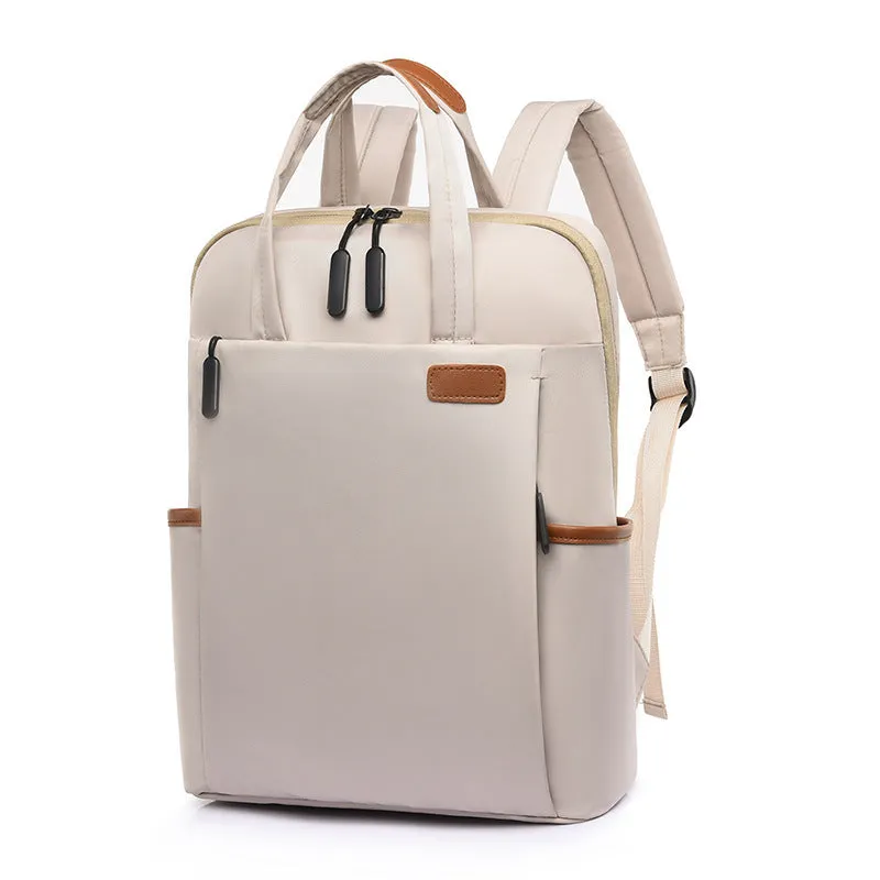 15.6-inch canvas computer backpack in black with waterproof finish and multiple internal compartments
