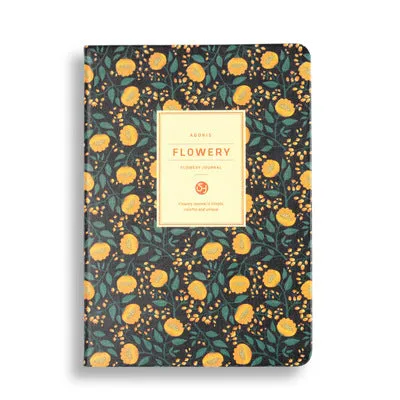 Leather wireless bound notebook with 120gsm Daolin paper in A5 size shown open on a desk with colour cover options