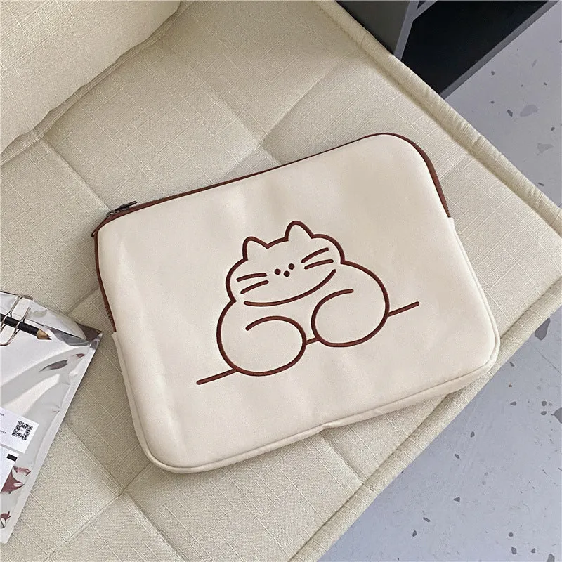 Nylon laptop sleeve with embroidered cat design and zipper closure, shown in small and large sizes.