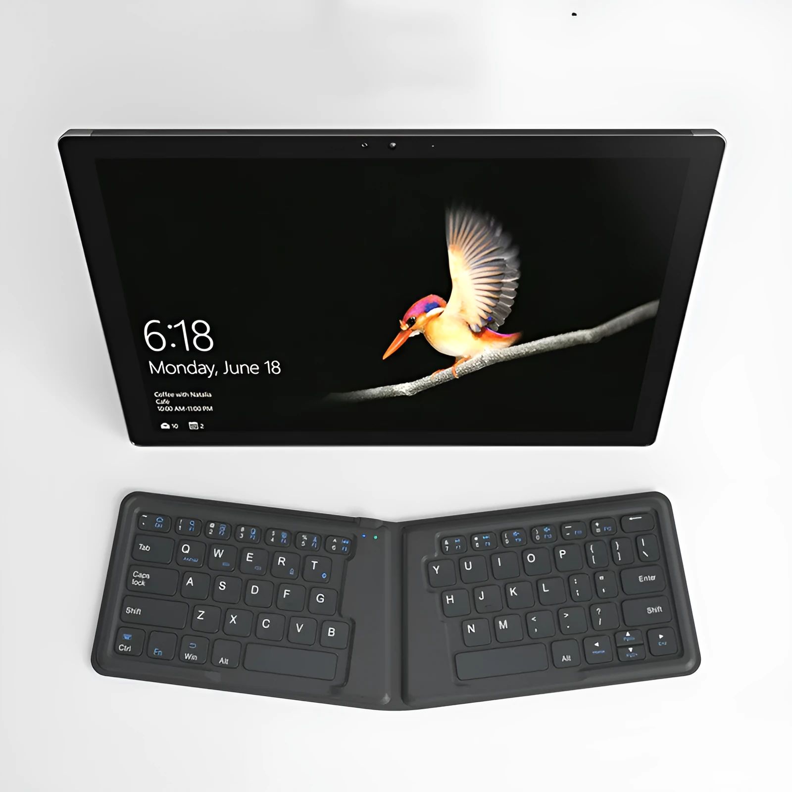 Aerospace folding Bluetooth keyboard with 64 keys and USB charging cable