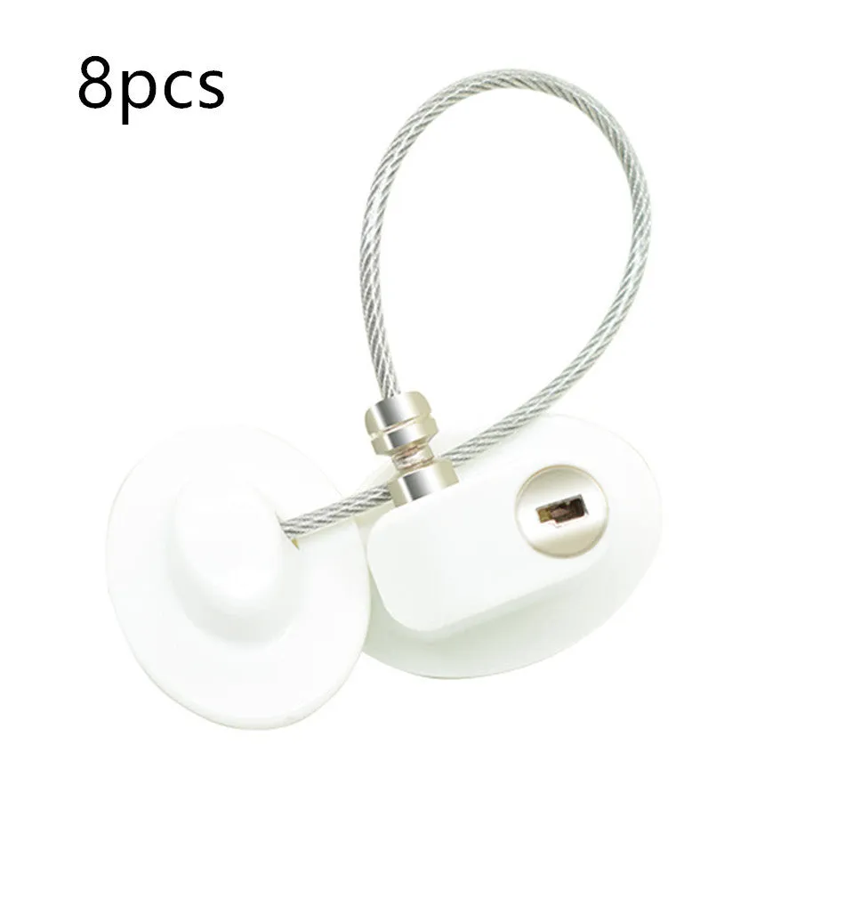 White window security chain lock with steel cable and adhesive base on a window frame