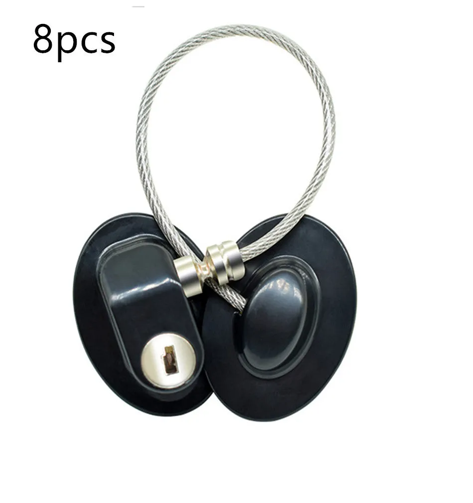 White window security chain lock with steel cable and adhesive base on a window frame
