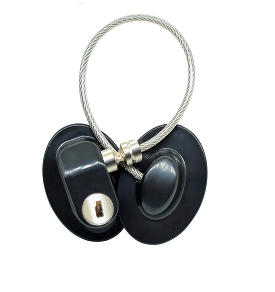 White window security chain lock with steel cable and adhesive base on a window frame