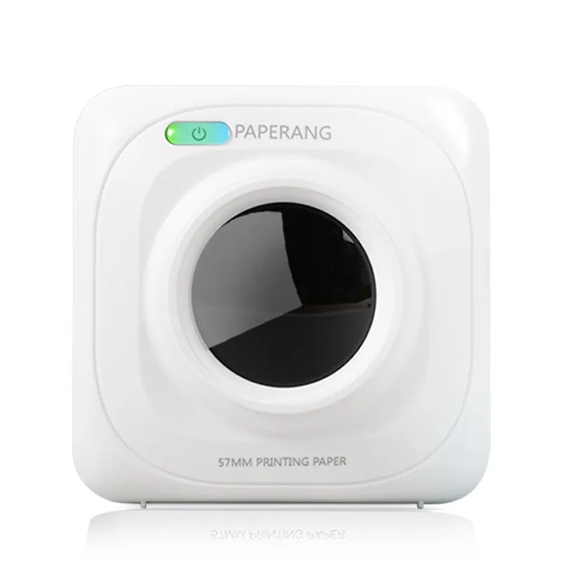 White pocket Bluetooth thermal label printer on desk with smartphone app interface visible