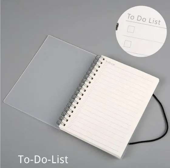 Plastic cover spiral coil notebook with transparent PVC cover, elastic rope closure, and cream paper pages