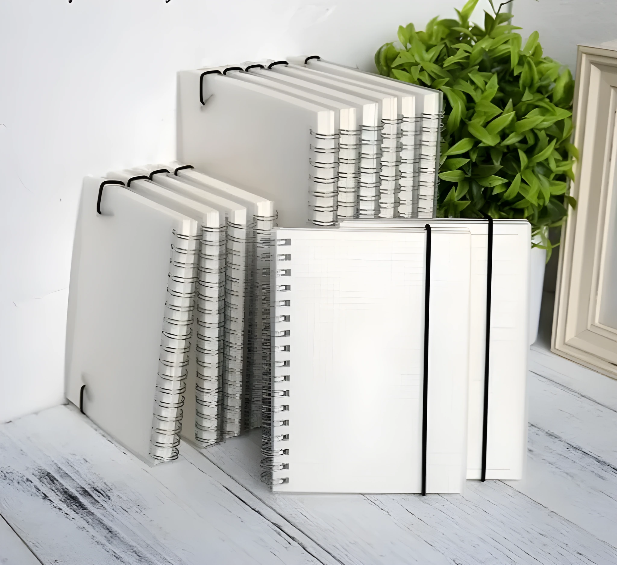 Plastic cover spiral coil notebook with transparent PVC cover, elastic rope closure, and cream paper pages