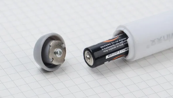 Black and gray electric eraser with plastic body, 166x15 mm, on a white background