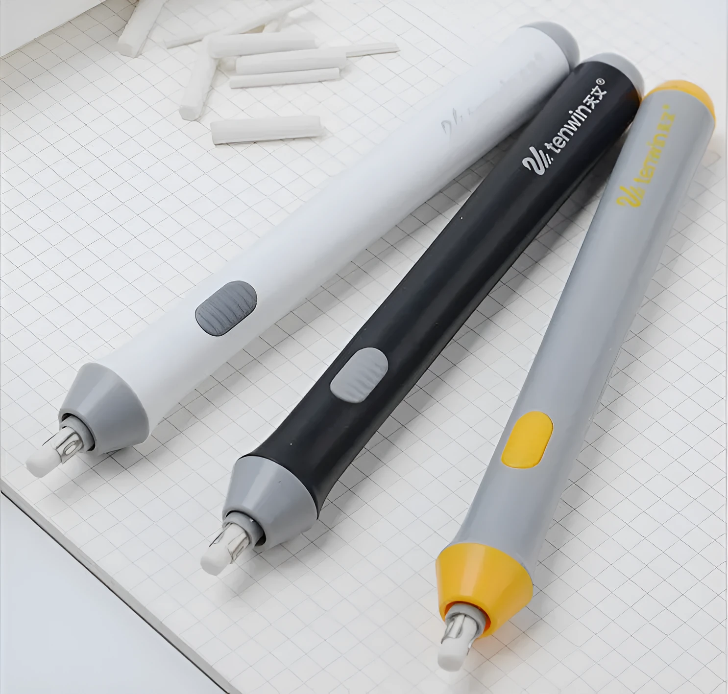 Black and gray electric eraser with plastic body, 166x15 mm, on a white background