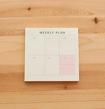 Small 9.5cm square paper planner with 60 sheets, available in monthly, weekly, or work planner style