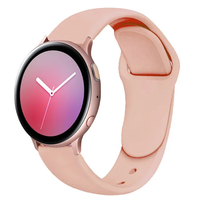 Samsung Galaxy Active 2 smartwatch with a purple silicone replacement strap featuring a reverse buckle clasp.