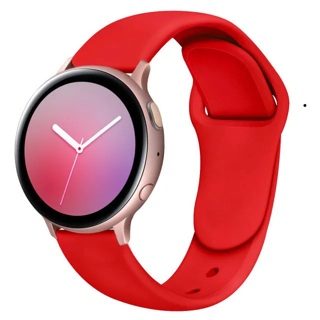 Samsung Galaxy Active 2 smartwatch with a purple silicone replacement strap featuring a reverse buckle clasp.