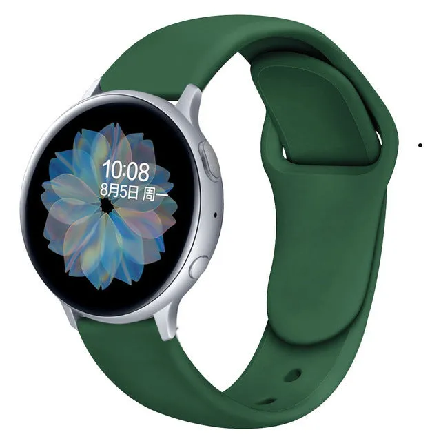Samsung Galaxy Active 2 smartwatch with a purple silicone replacement strap featuring a reverse buckle clasp.