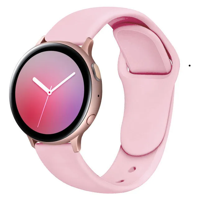 Samsung Galaxy Active 2 smartwatch with a purple silicone replacement strap featuring a reverse buckle clasp.
