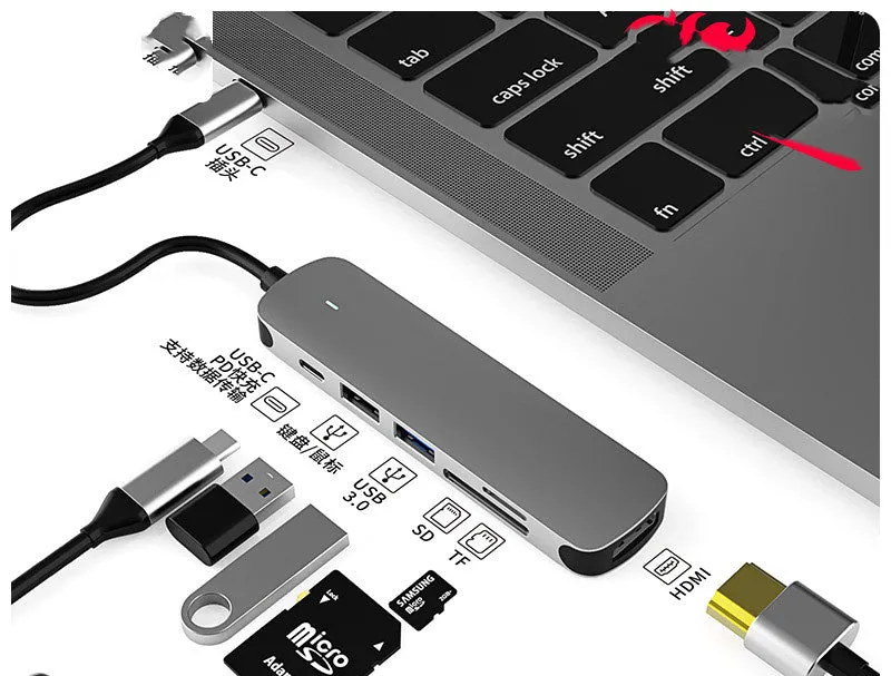 USB-C multi-function hub docking station with HDMI and wireless charging for notebook