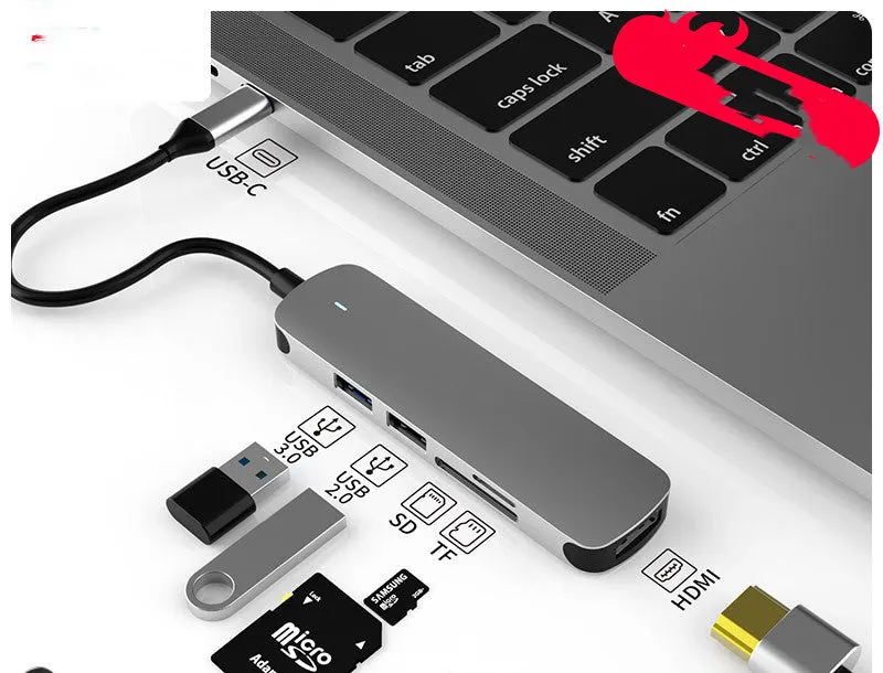 USB-C multi-function hub docking station with HDMI and wireless charging for notebook