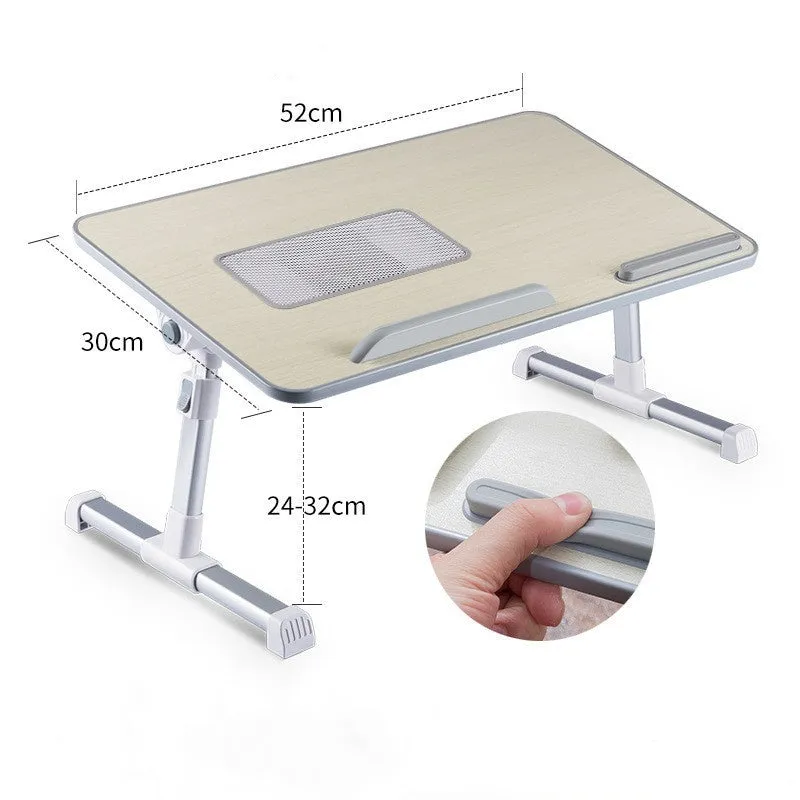 Adjustable laptop desk stand with wood-based panel, folded flat on a surface, 52x30 cm black colour