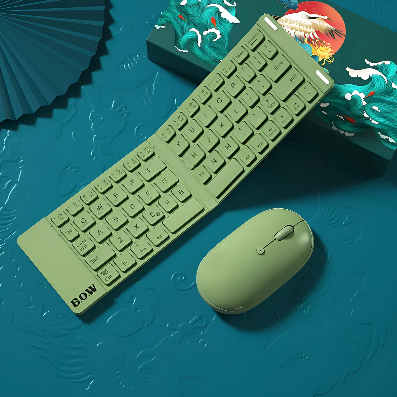 Folding Bluetooth keyboard and mouse set in elegant white, closed position for travel