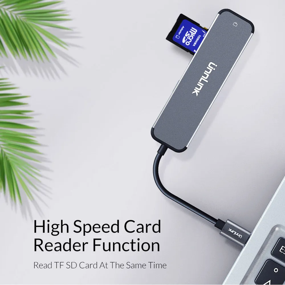 Aluminium alloy type-C docking station with HDMI, SD/TF, and USB 3.0 ports in silver colour