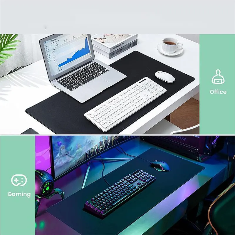 Large black and white gaming mouse pad with non-slip rubber bottom and cloth cover on a desk