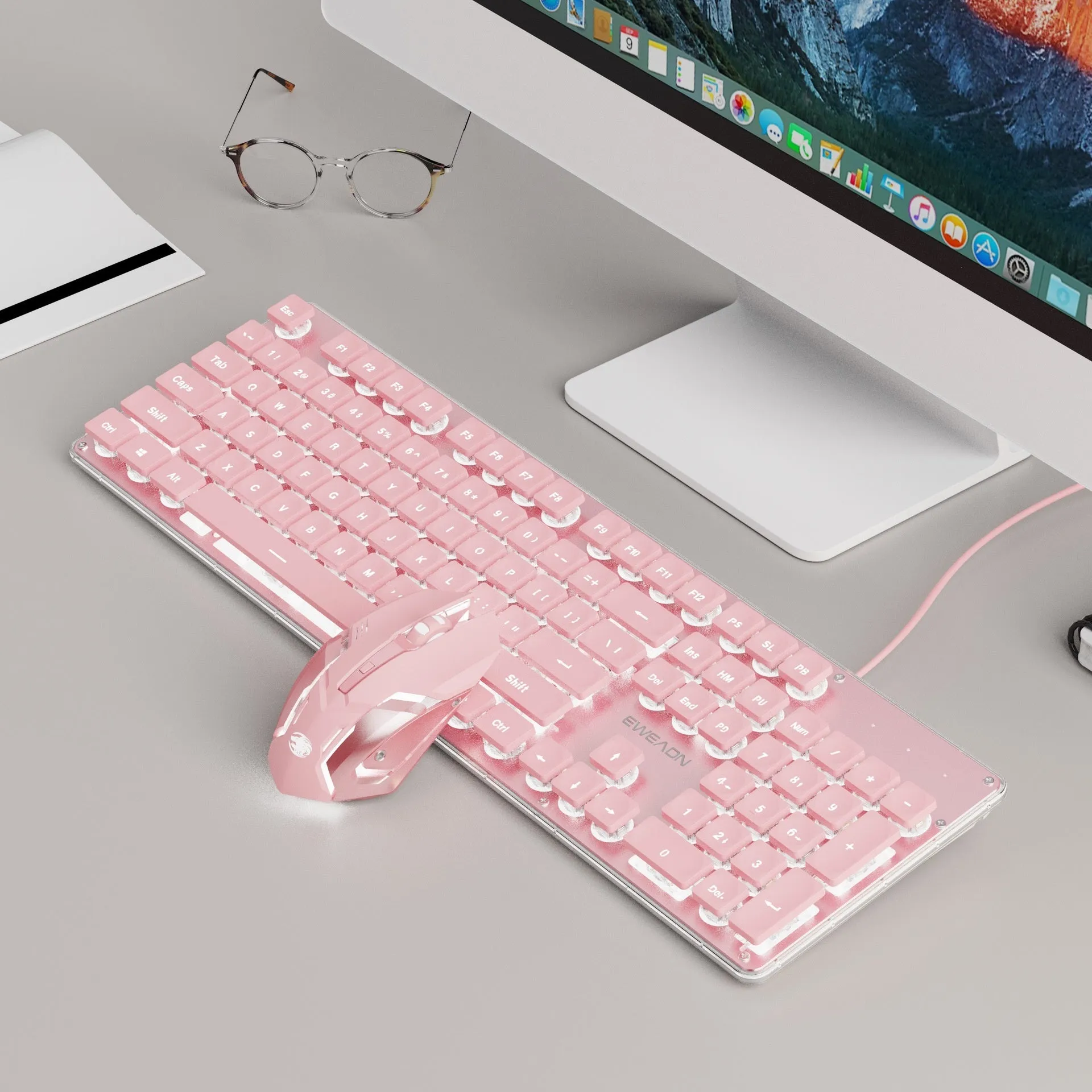 Button mute wired mechanical keyboard with USB cable in Metal Black blue backlight colour option.