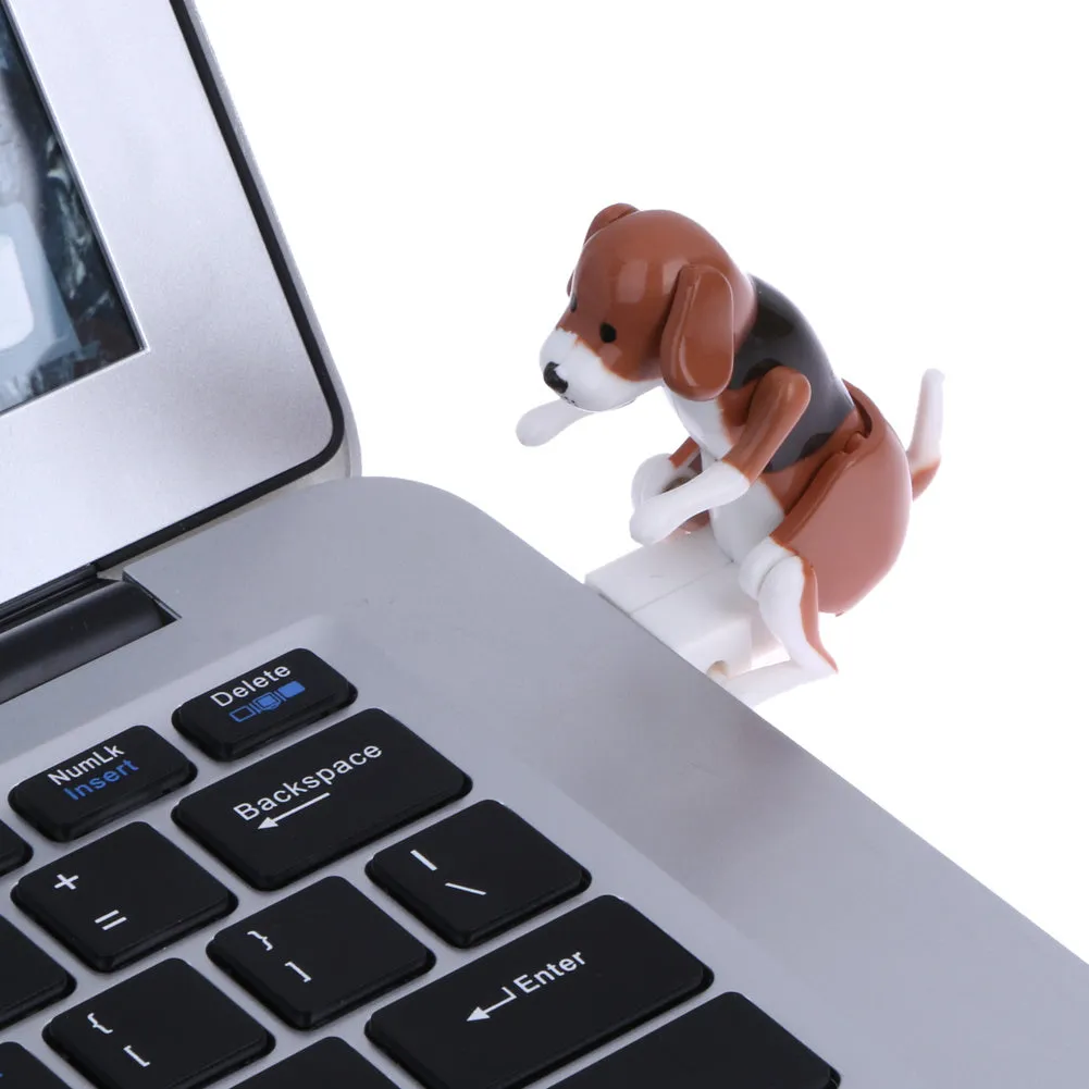 Brown USB powered cartoon dog toy measuring 60x30x60mm on a desk
