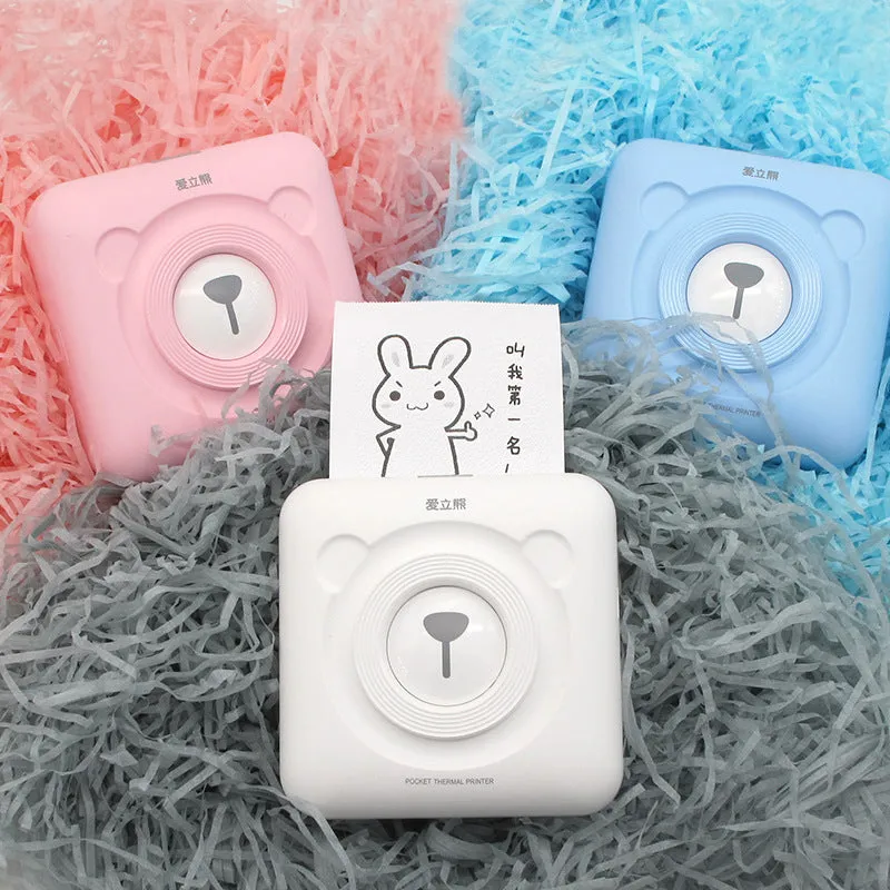 Portable mini thermal label printer in white, 7.9 x 7.9 x 4.2cm, with rechargeable battery and thermal paper roll