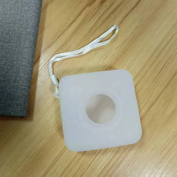 Portable mini thermal label printer in white, 7.9 x 7.9 x 4.2cm, with rechargeable battery and thermal paper roll